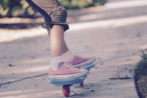 feet of a girl on a ripstick