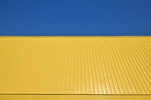 yellow wall and blue sky 
