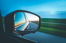 view in the side mirror of a car