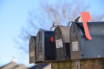 row of mailboxes in a neighborhood 