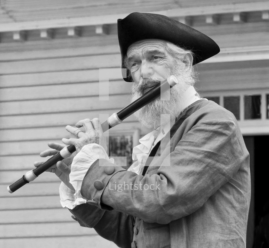 A patriot playing a flute 