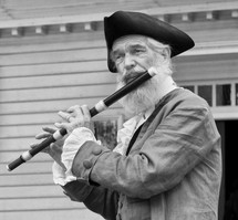 A patriot playing a flute 