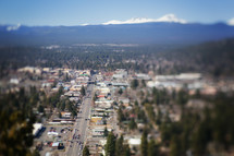 aerial view over a mountain valley town 