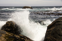 Waves crash on the rocky coast