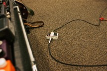 carpet floor with band equipment, cord