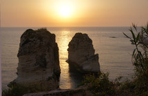 Overlooking two ocean rock formations at sunrise