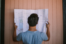 man looking at a map 