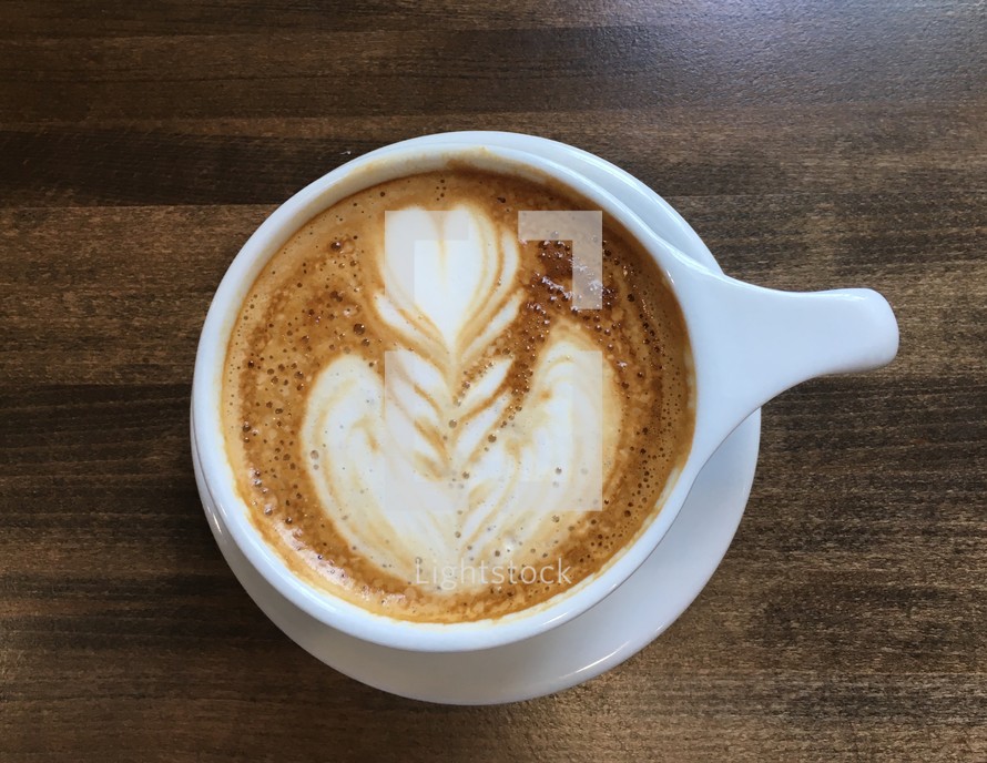 heart shape creamer in coffee