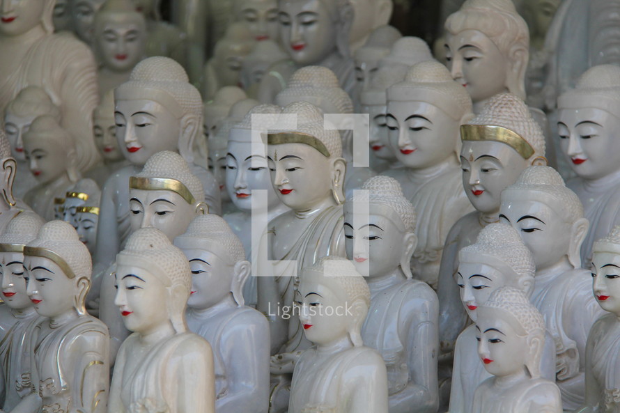 white porcelain Buddha statues