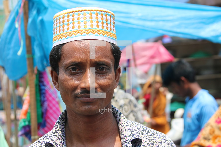 Bangladeshi Muslim man in local market