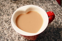 Heart-shaped coffee cup.