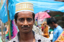 Bangladeshi Muslim man in local market