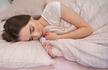 young woman Sleeping On A Pillow