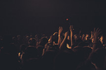 raised hands of an audience 
