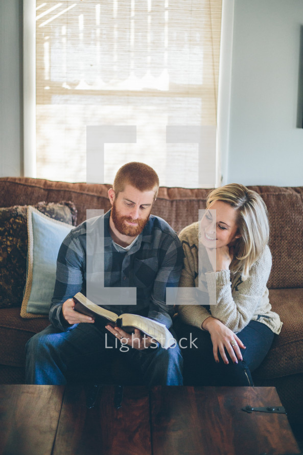 couple reading a Bible 