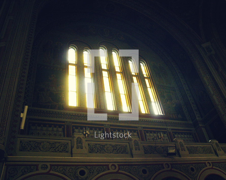sunlight through windows in a cathedral
