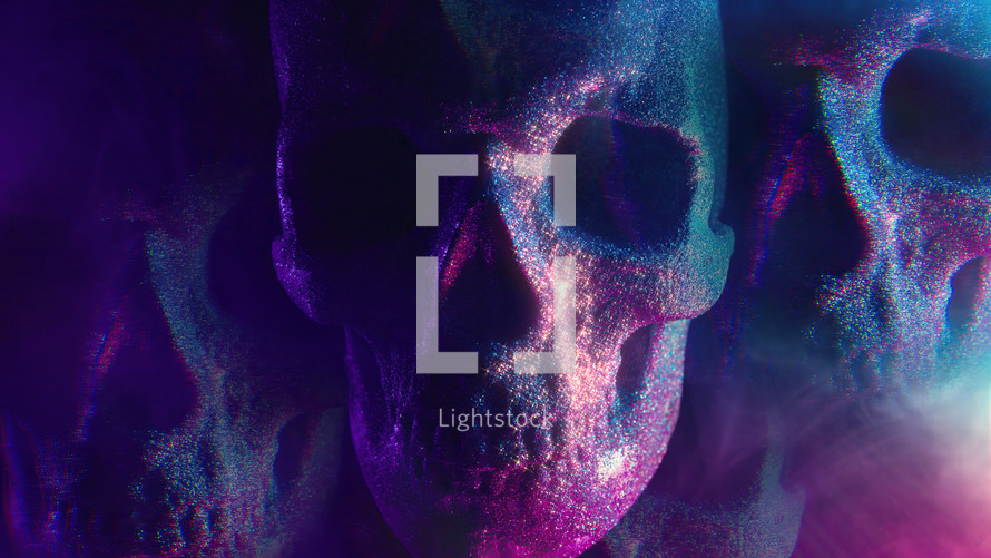 Human skull with neon colorful light. Halloween celebration, mystique, glamour, style concept. Power of symbolism - mortality, rebellion. Exploring life, death, gothic aesthetics. Visual metaphor.
