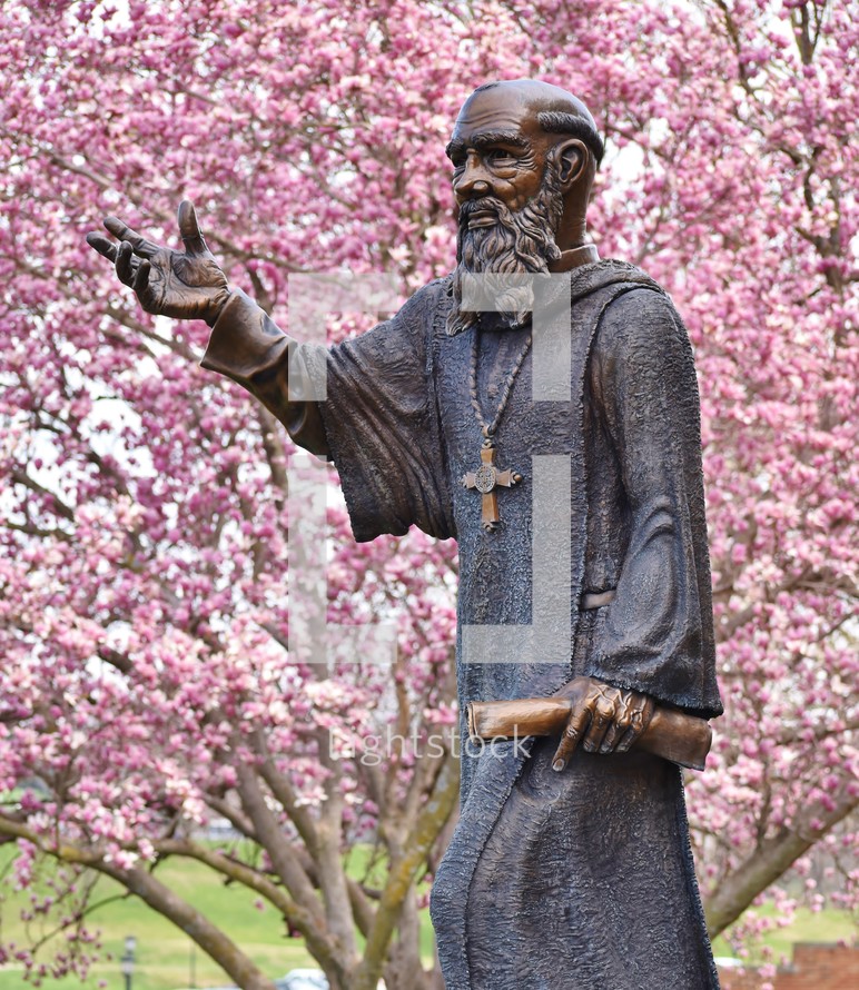 Saint Benedict statue in spring 