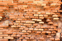 eroded rough brick wall