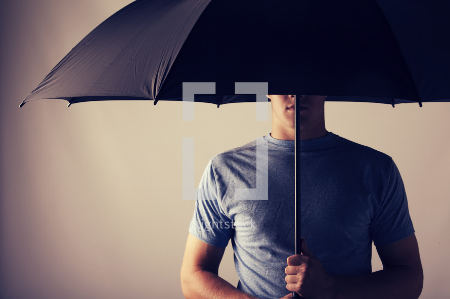 man under an umbrella 