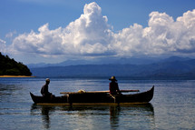 men on a fishing boat in Madagascar 