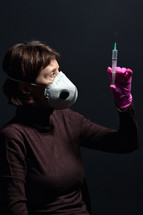 Woman Wearing Medical Protective Virus Mask and Syringe