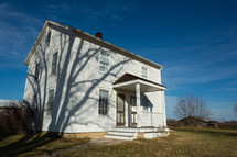 White farm house in rural area