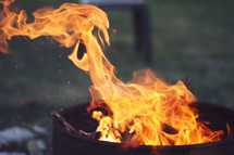 Close up shot of blurred flames in a campfire.