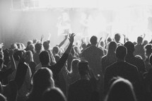 People worshipping Jesus with hands high during worship. 