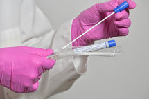 Nurse Holds A Swab For The Coronavirus / Covid19 Test