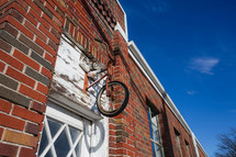 Red brick building with bike decor