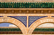 green tiles on a roof in Bourguiba
