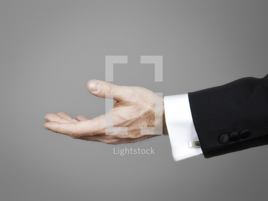 outstretched hand of a businessman 