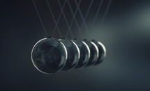 Close up of balls on Newton's Cradle