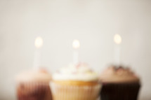 blurry cupcakes and candles 