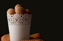 brown eggs in a bucket 