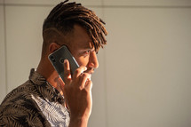 a man talking on a cellphone 