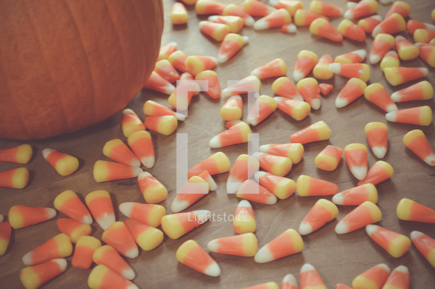 orange pumpkin and candy corn 
