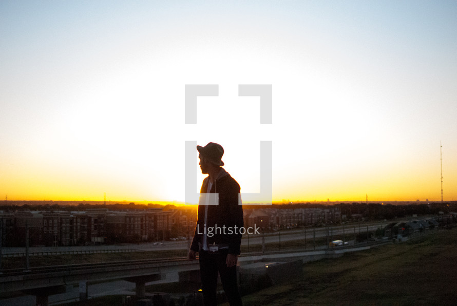 silhouette of a man at sunset 