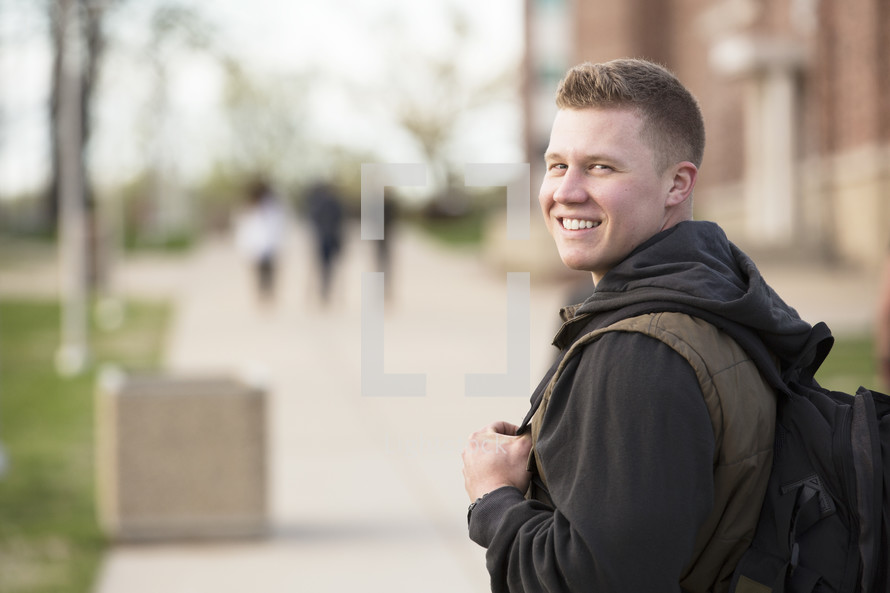 young man on a college campus 