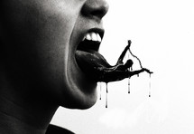 A person speaks and their tongue is covered in black and filth