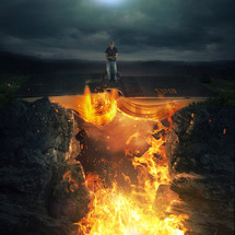 man standing on a burning Bible bridge 