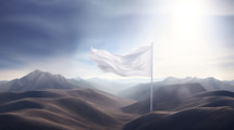 White surrender flag blowing in the wind on a hill.