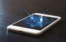 water droplet splash on a cellphone screen 
