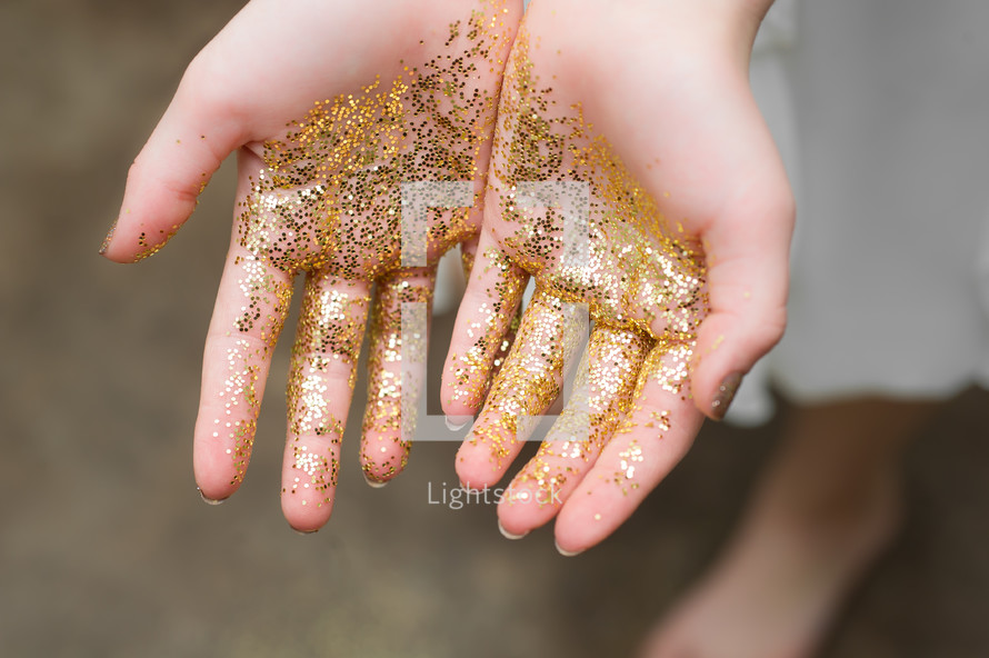glitter on the palms of hands