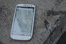 cellphone with a cracked screen 