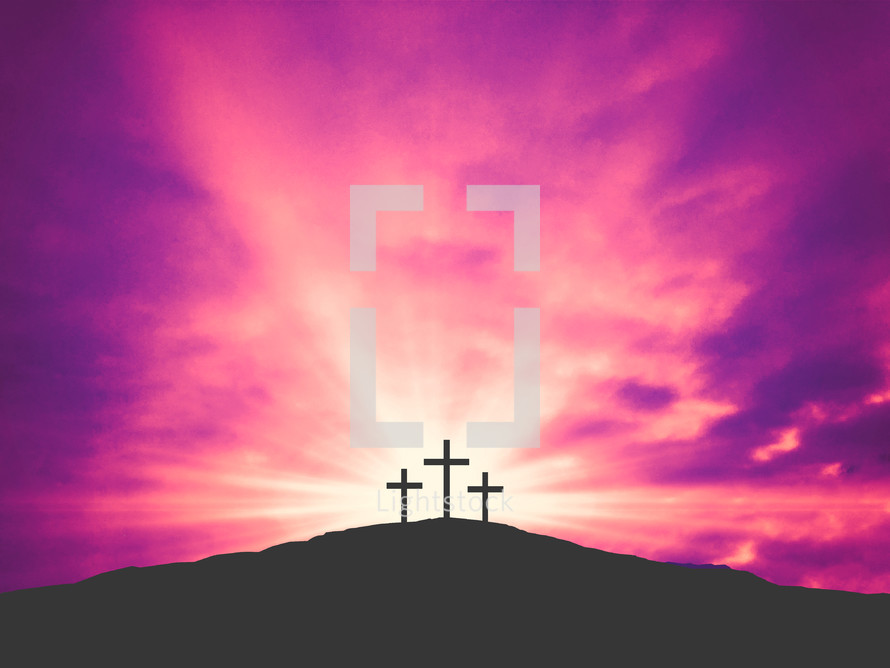 silhouttes of crosses against a pink background 