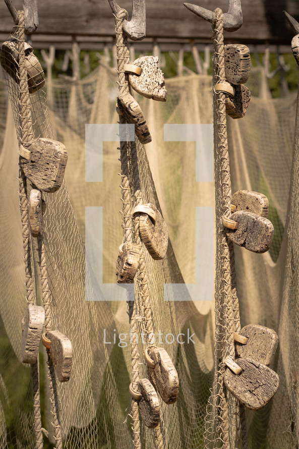 A fishing net hanging to dry 