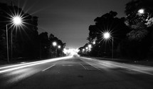 road and streetlights at night 