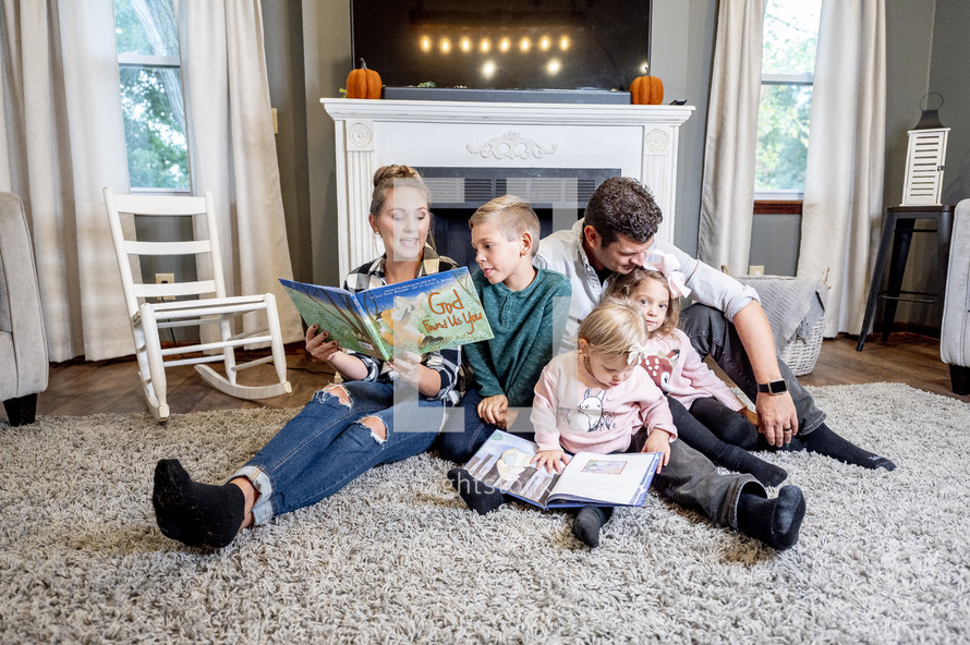 a family reading children's books together 